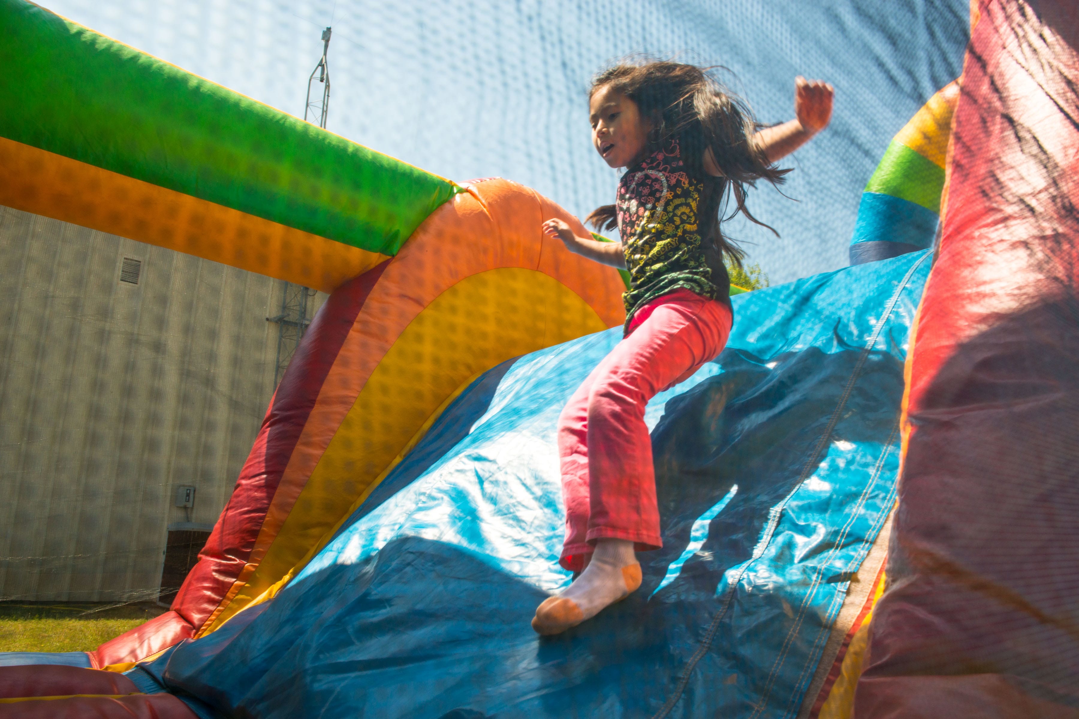 Kid Sliding Bounce Jump Around Party